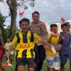 Satgas Ops Damai Cartenz Bangun Kedekatan Lewat Bermain Sepak Bola Bersama Anak-Anak Mimika