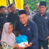 Jelang Puncak HUT Nasdem ke-14, Suhadirin Berbagi Sembako dan Beasiswa ke Warga