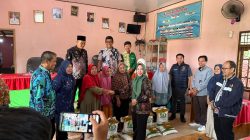 Polda Lampung Dampingi Bapanas dalam Penyaluran Bantuan Pangan di Dua Desa di TubabaPolda Lampung Dampingi Bapanas dalam Penyaluran Bantuan Pangan di Dua Desa di Tubaba
