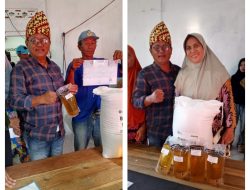 1.001 KPM Desa Mekar Mulya Terima Bantuan Beras Bapanas dan Minyak Goreng